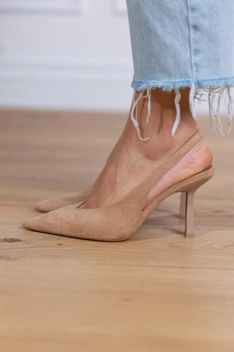 Versatile women's pointed-toe slingback pumps with a sleek stiletto heel. Perfect for various fashion occasions.