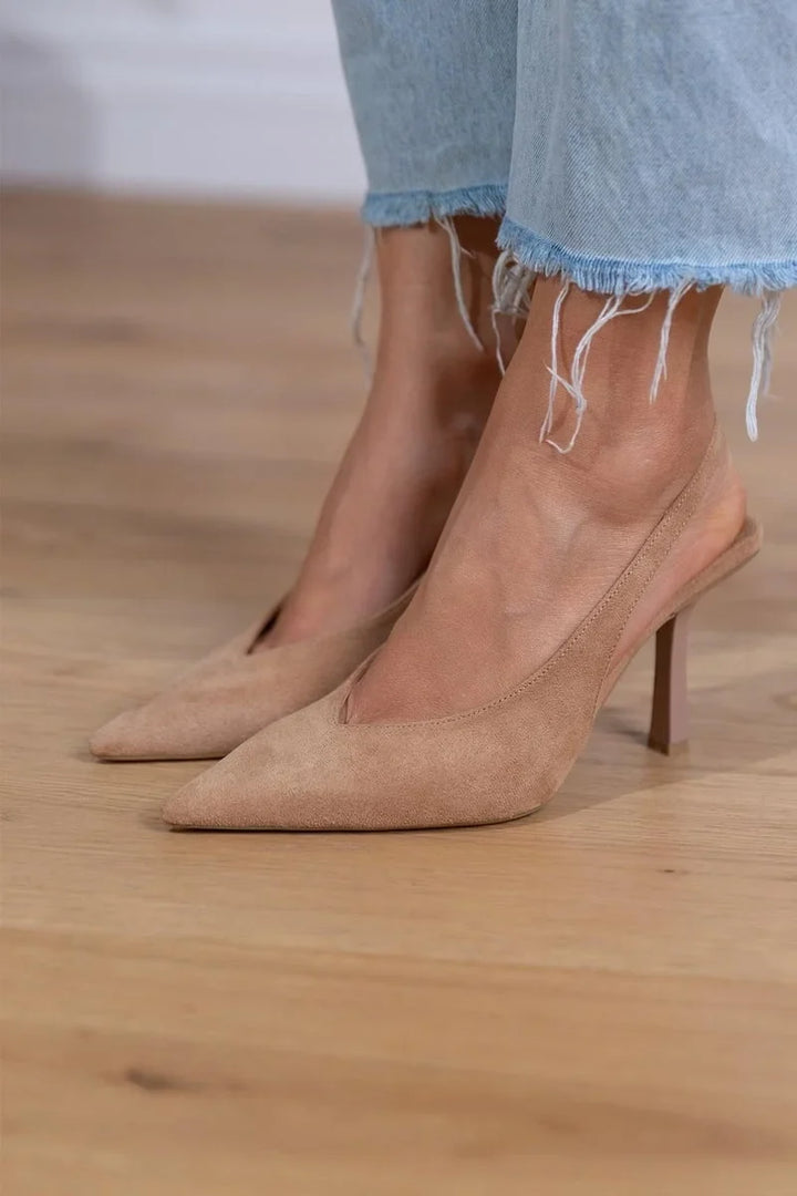 Polished women's pointed-toe slingback stiletto pumps, ideal elegant heels for formal attire & evening events.