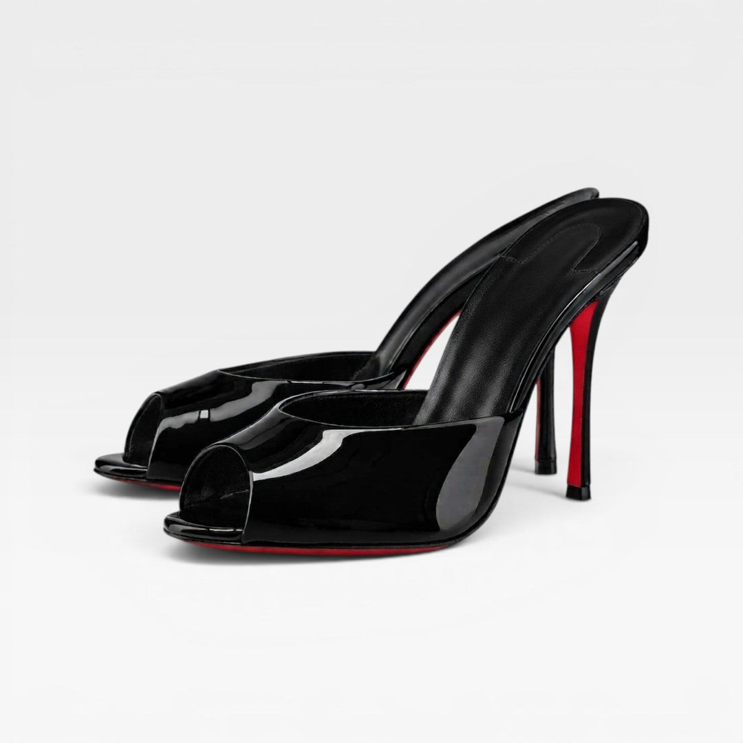 Women's sleek pointed toe evening mules with stiletto heel, sophisticated party and occasion shoes.