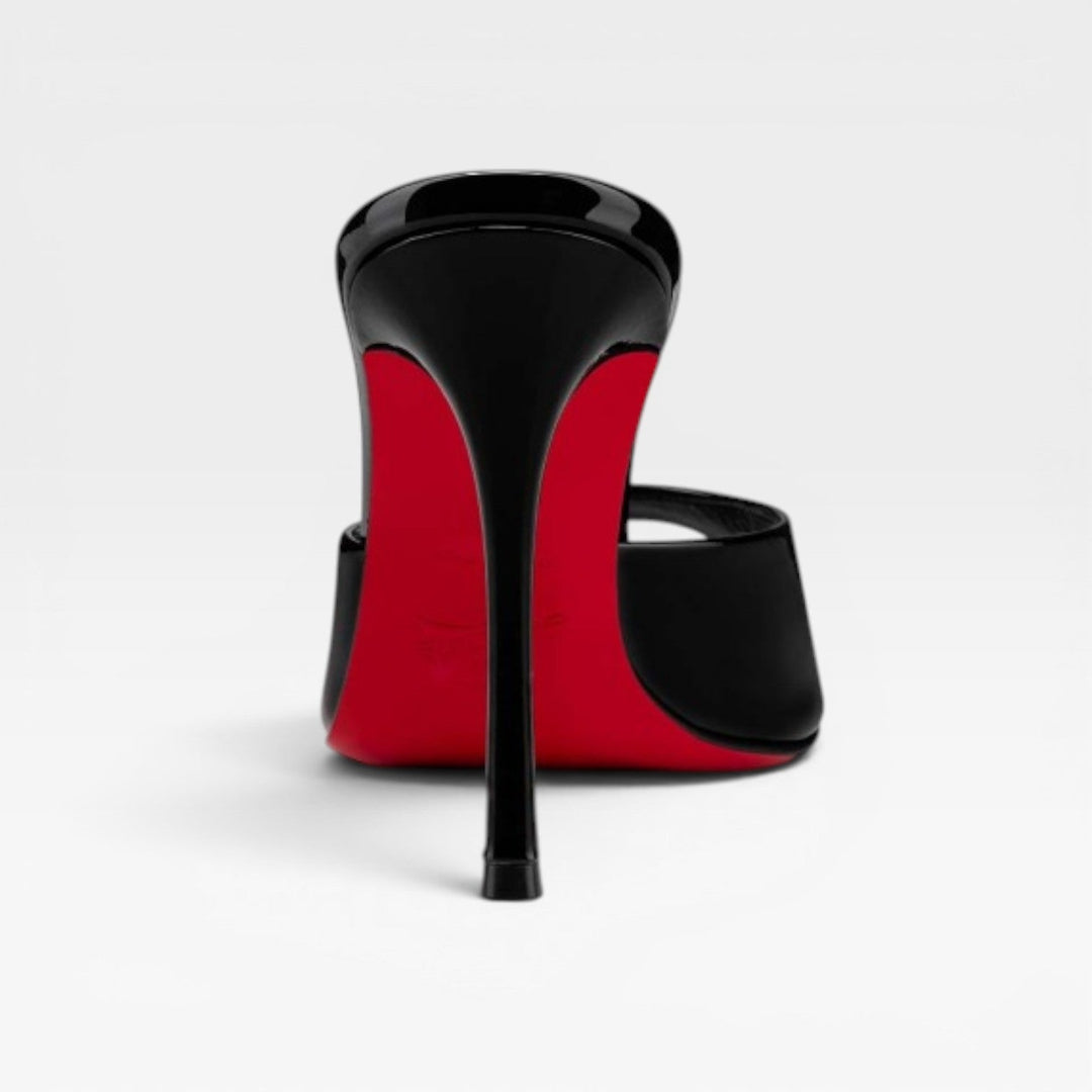 Sophisticated women's pointed toe evening mules, comfortable slip-on party heels with stiletto style.