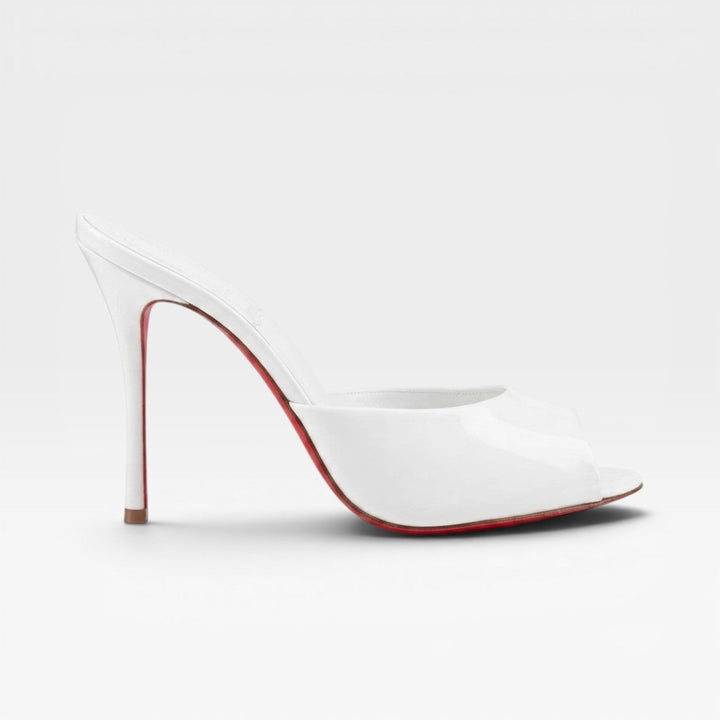 Elegant black pointed toe stiletto mules, ideal for women's evening, wedding, and special occasion footwear.