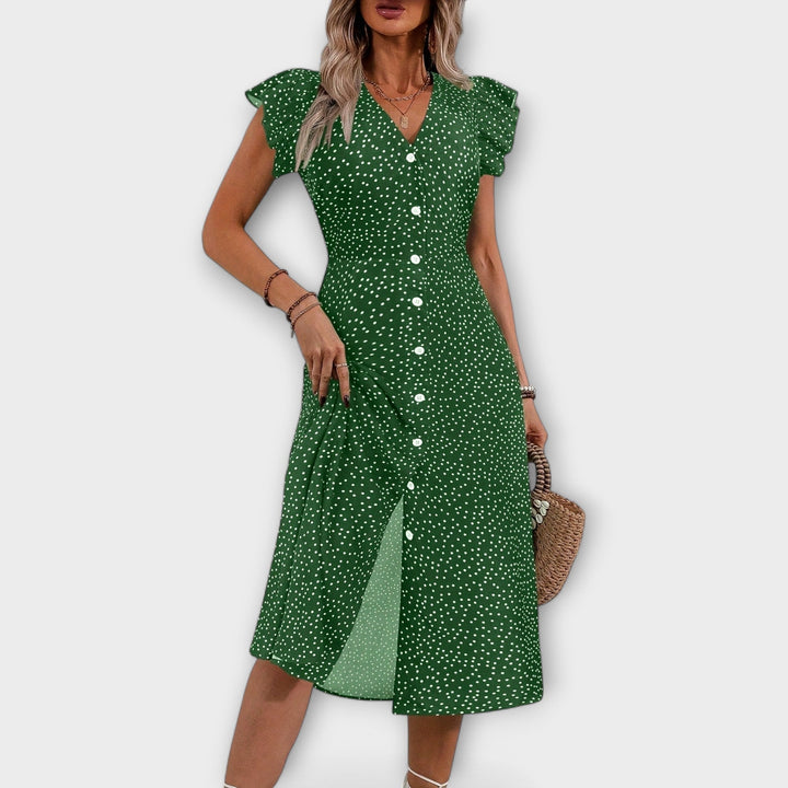 Versatile women's polka dot A-line midi dress, suitable for elegant spring, summer, or casual events.