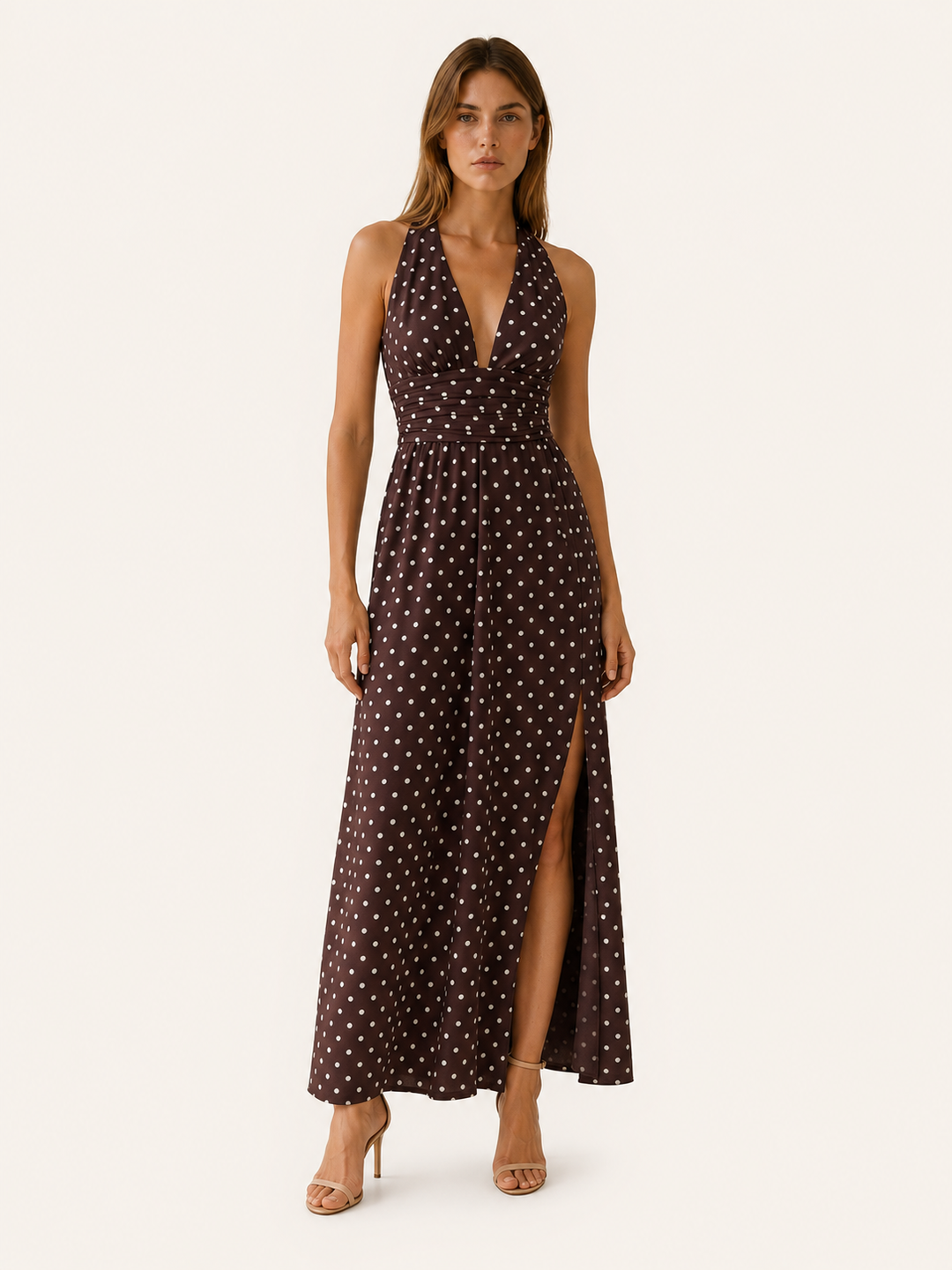 Elegant women's polka dot halter maxi dress, perfect for evening events or chic casual wear. Flattering, flowy design.