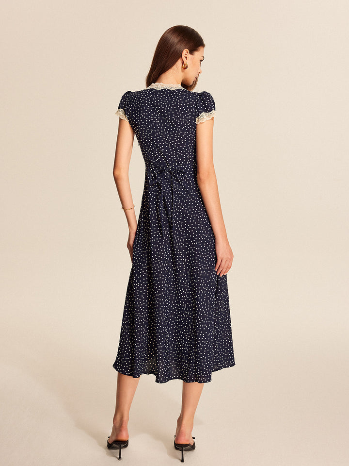 Fashionable women's polka dot midi dress with graceful lace & puff sleeves. An elegant choice for any summer occasion.