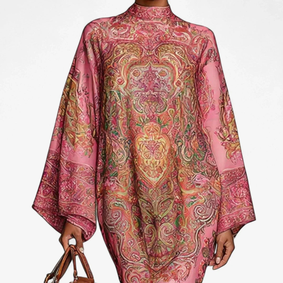 Comfortable pink caftan midi dress for women, featuring a stylish mock neck & flowy batwing sleeves. Perfect vacation dress.