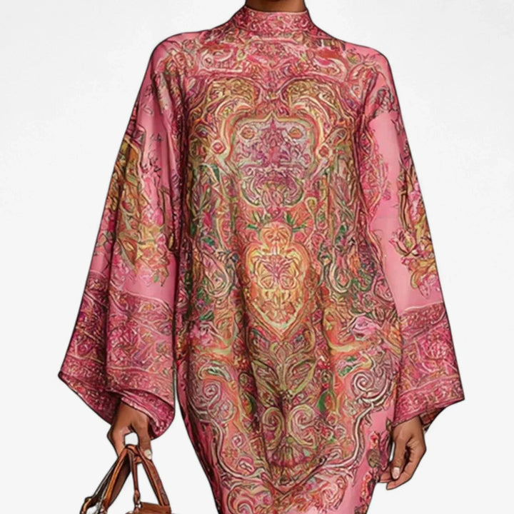 Comfortable pink caftan midi dress for women, featuring a stylish mock neck & flowy batwing sleeves. Perfect vacation dress.