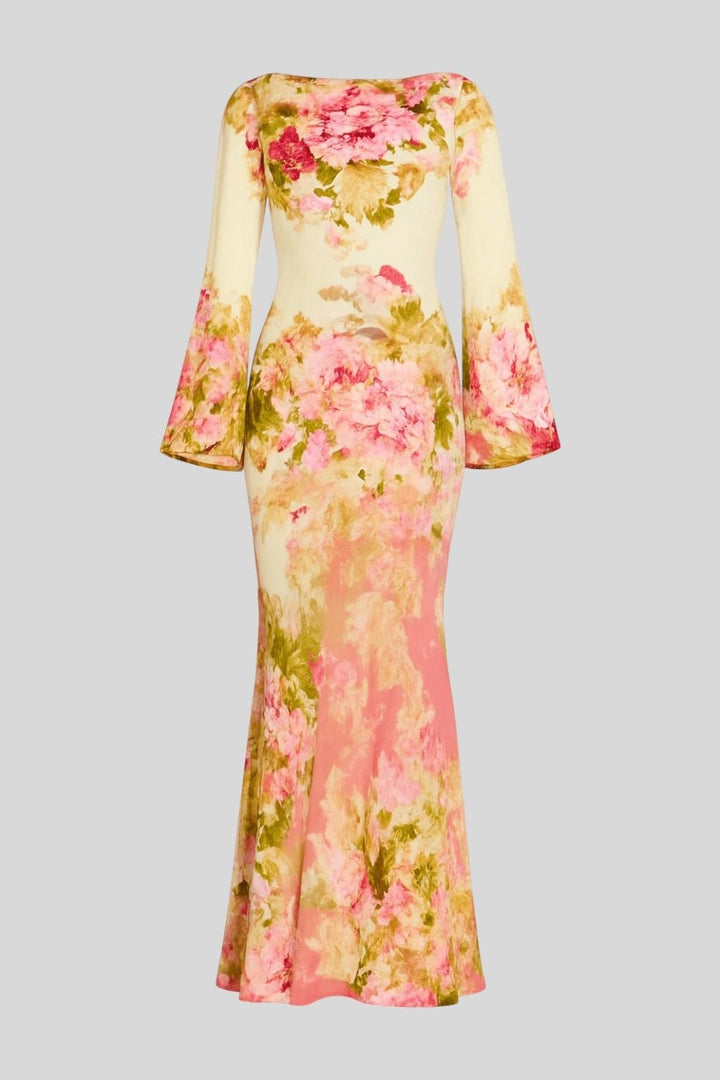 Bohemian style women's flowing printed maxi dress, ideal for romantic spring fashion or warm weather casual wear.