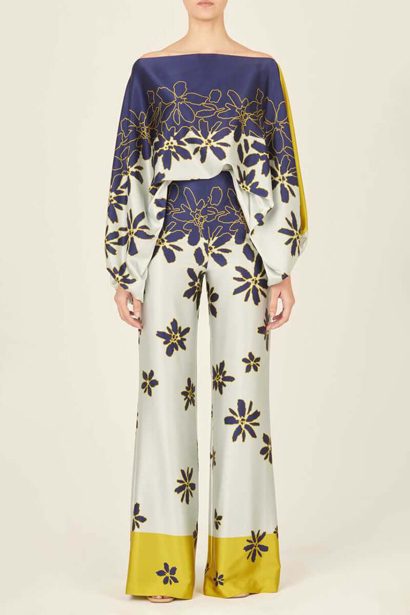 Women's fashion two-piece set: off-shoulder long sleeve printed top with an elegant matching skirt.