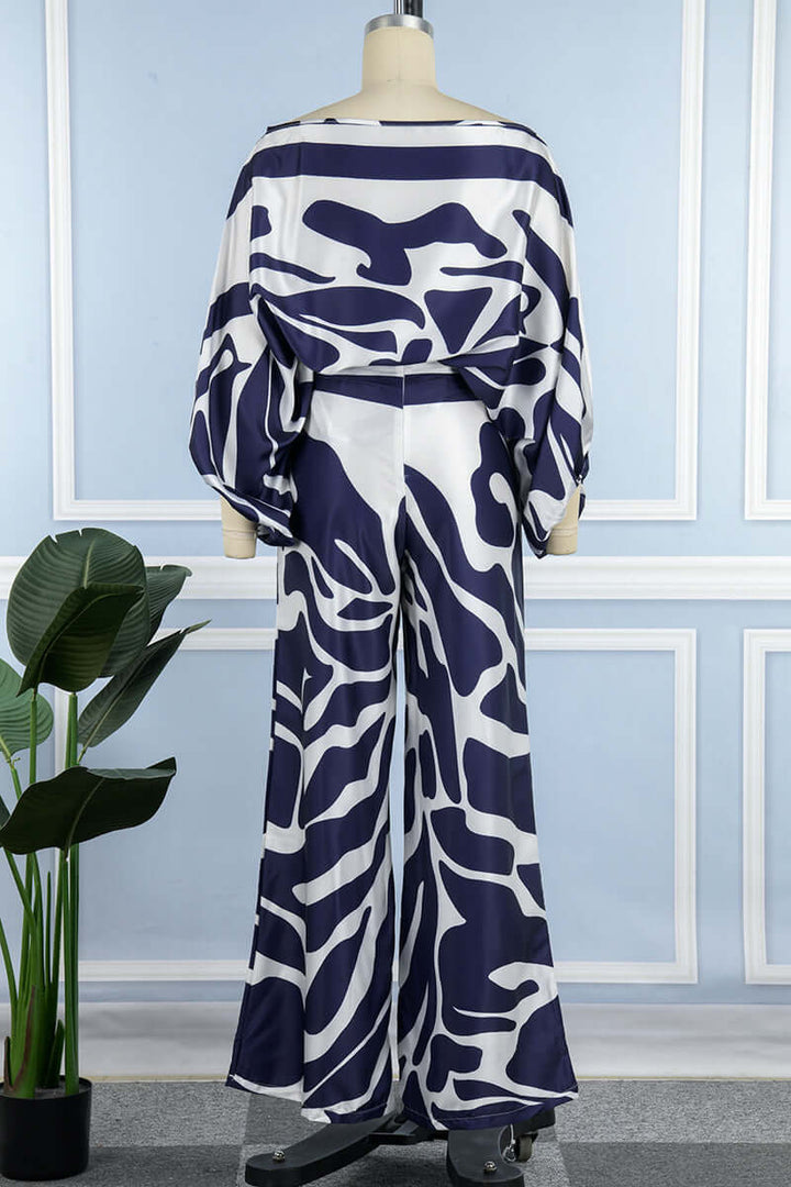 Sophisticated women's printed off-shoulder long sleeve two-piece set, perfect for winter elegance.