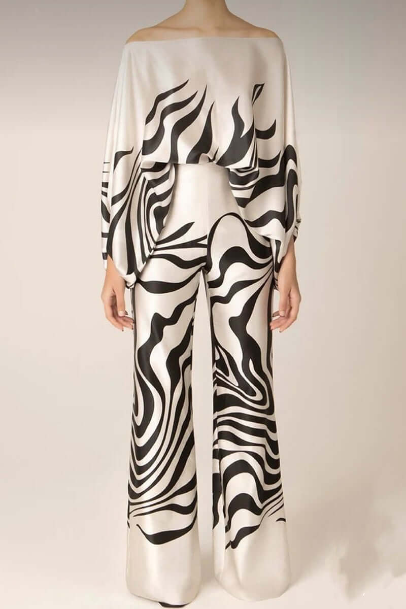 Stylish women's printed off-shoulder long sleeve skirt set, perfect for versatile winter party wear.