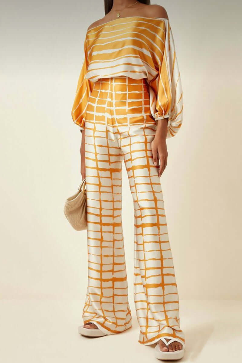 Versatile women's printed off-shoulder long sleeve two-piece set, an elegant choice for party outfits.
