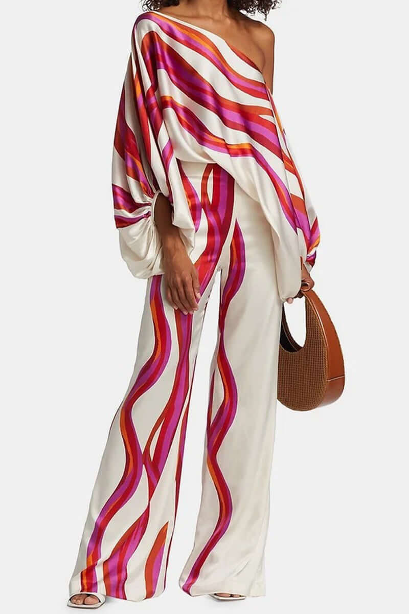 Chic women's off-shoulder long sleeve printed top & matching skirt two-piece set for winter.