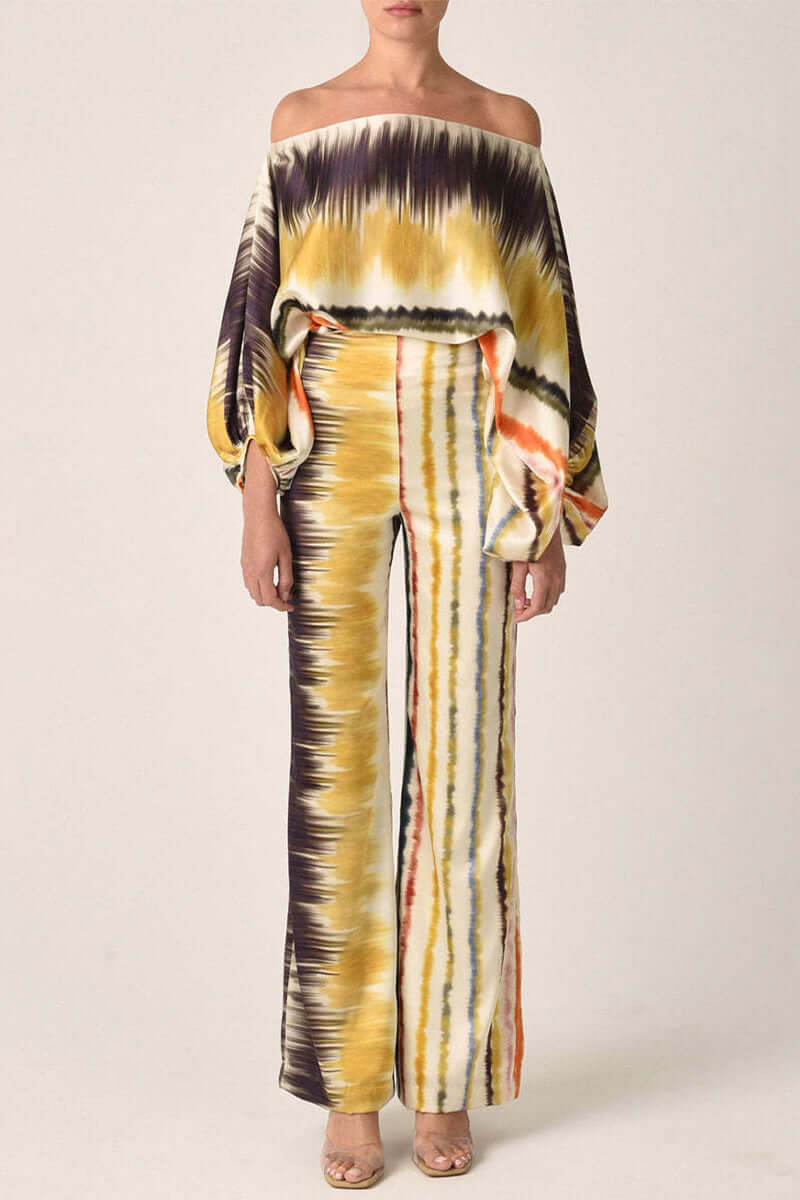 Women's printed off-shoulder long sleeve two-piece set. An elegant skirt and top outfit for events.