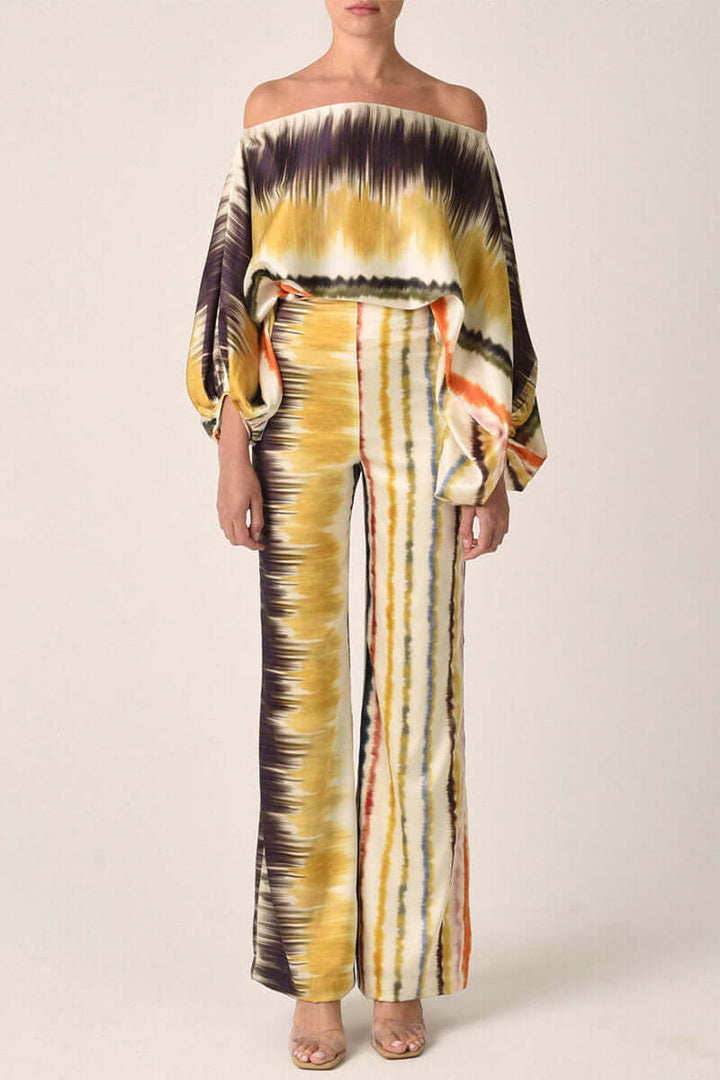 Women's printed off-shoulder long sleeve two-piece set. An elegant skirt and top outfit for events.