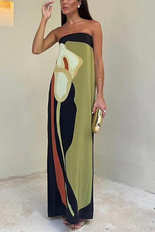 Beautiful women's strapless maxi dress with an elegant print, suitable for formal or evening wear.