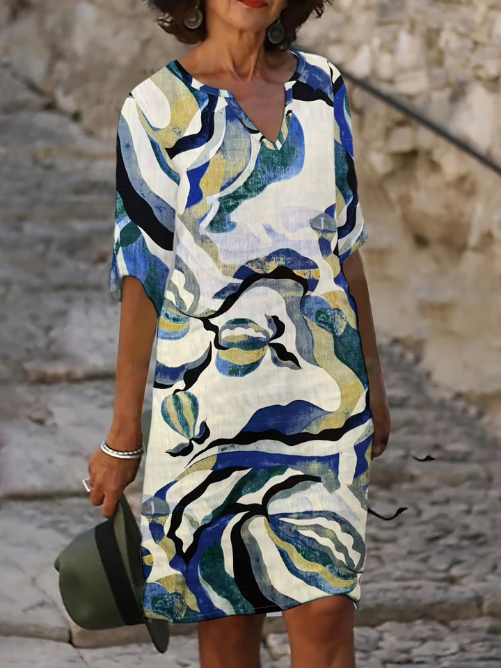 Colorful printed summer dress for women, comfortable and flowy, ideal for beach or casual day outings.