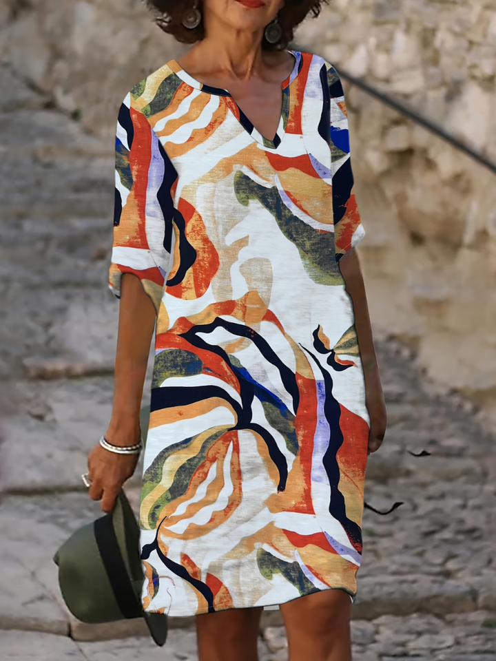 Effortless style women's printed summer dress, knee-length, versatile for casual, vacation, or elegant day wear.