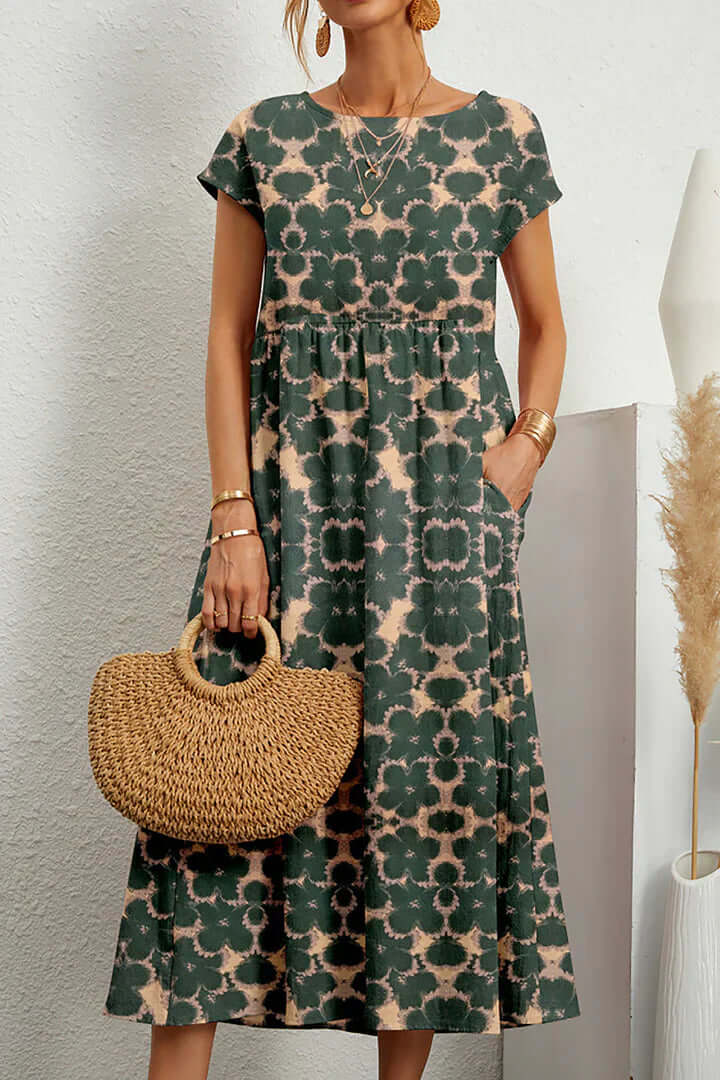 Chic women's printed flowy dress, an elegant summer choice for parties or versatile everyday fashion.