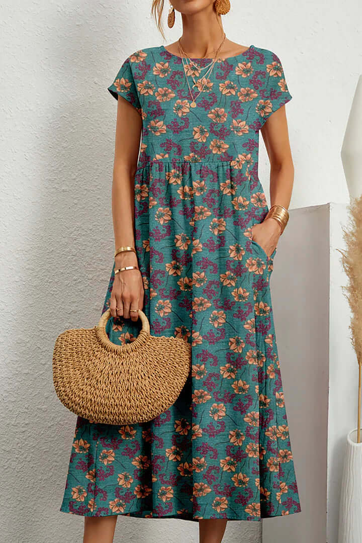 Beautifully printed women's summer dress, offering an elegant and flowy style for any occasion.