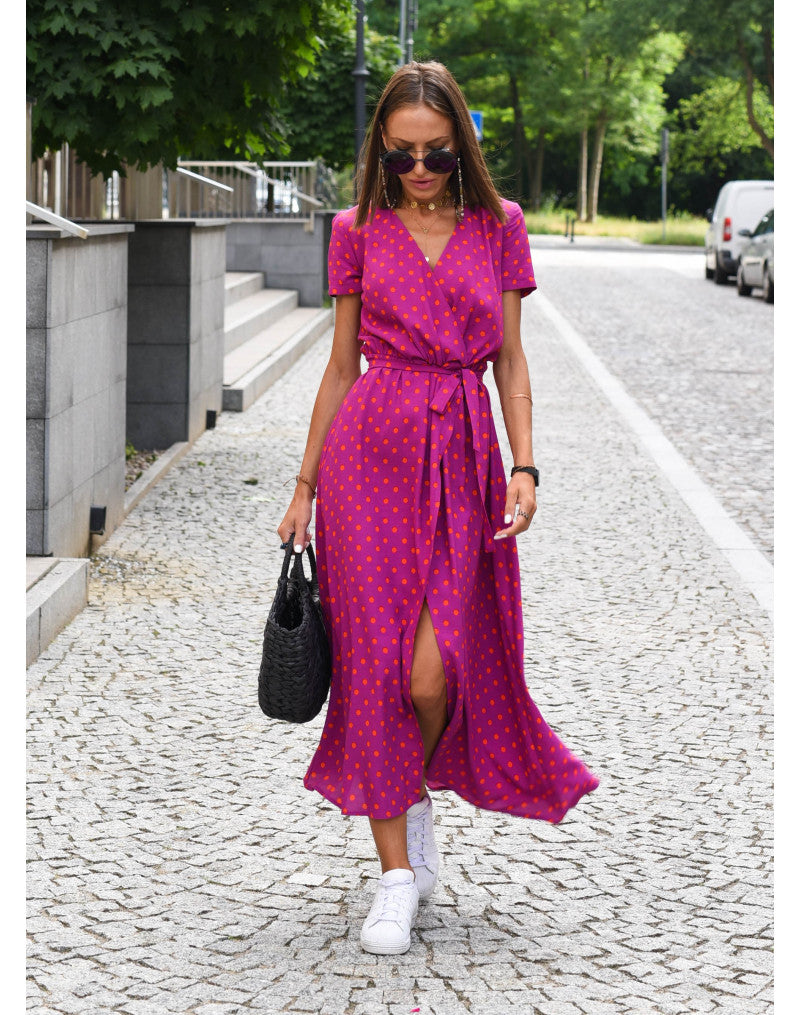 Beautiful women's printed wrap midi dress. Elegant V-neck, short sleeves, & tie waist for effortless spring fashion.