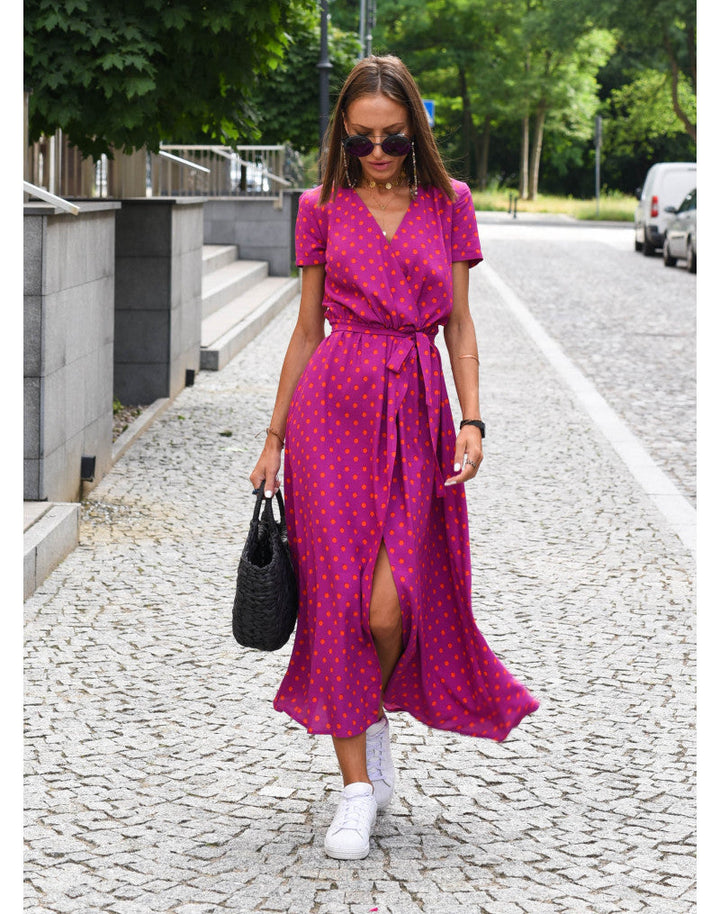 Beautiful women's printed wrap midi dress. Elegant V-neck, short sleeves, & tie waist for effortless spring fashion.