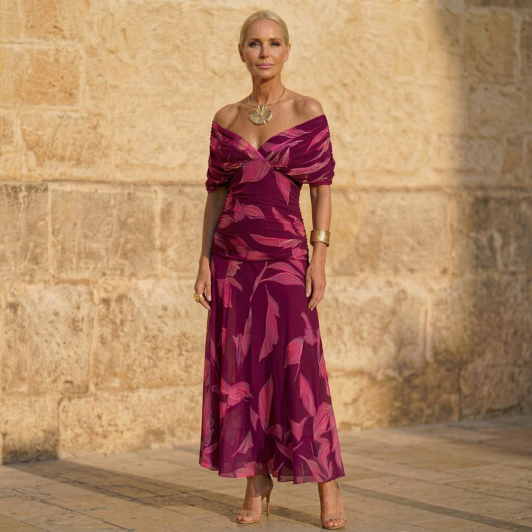 Elegant women's purple leaf print maxi dress with long sleeves, perfect for sophisticated occasion wear.