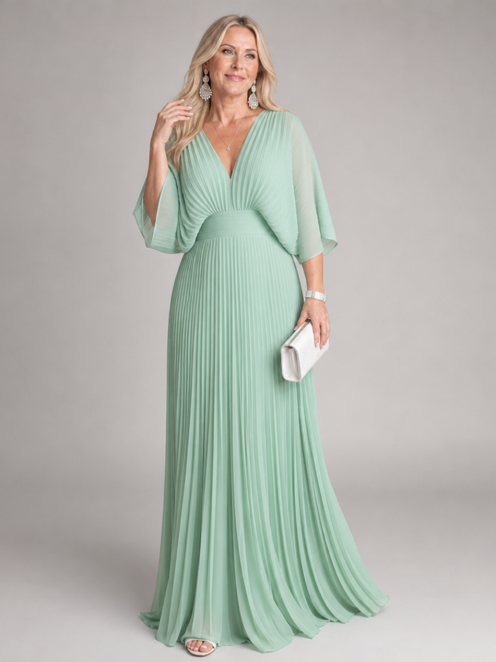 Formal women's purple long-sleeve V-neck pleated dress. Graceful flowy maxi gown for special occasions.