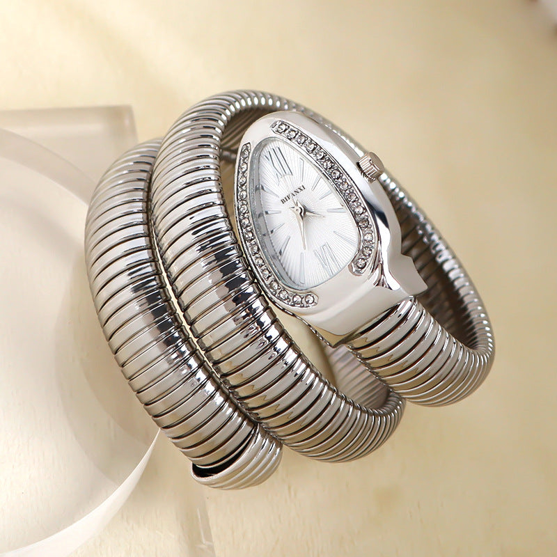 Rose gold elegant women's quartz snake watch, unique bracelet band, accessory.