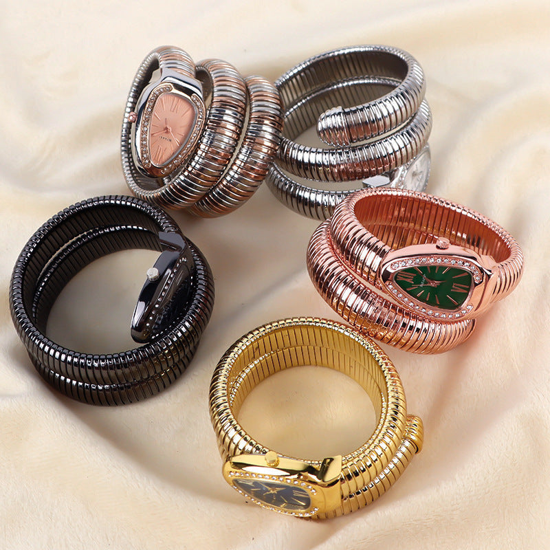 Fashion women's quartz watch, silver-tone snake bracelet, unique and stylish.