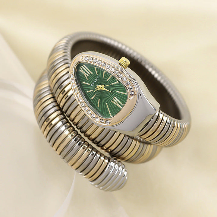 Rose gold-tone women's elegant snake bracelet watch, quartz movement, chic accessory.