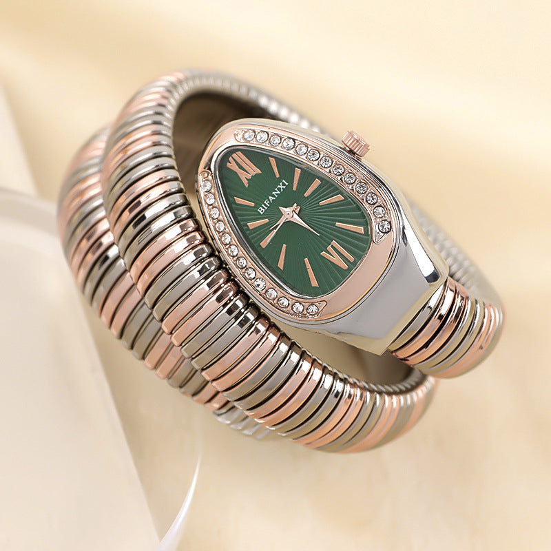 Unique women's quartz watch, rose gold-tone serpent bracelet, fashion statement.
