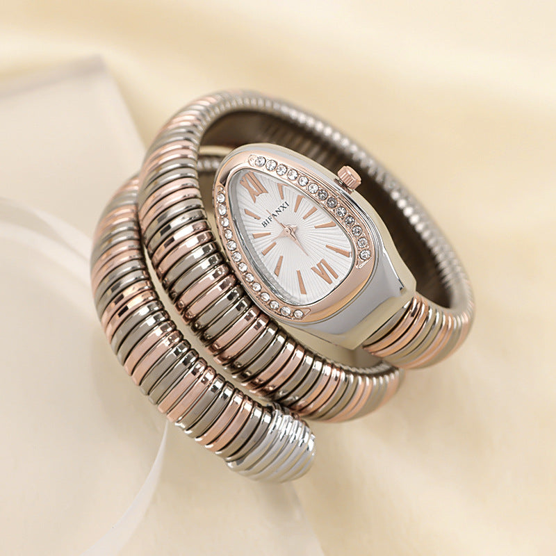 Elegant women's snake bracelet watch, quartz, black dial, sophisticated accessory.