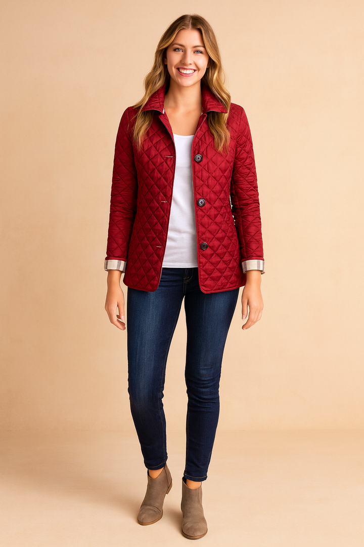 Elegant women's quilted winter jacket. Stylish, warm ladies' outerwear with button-down design.