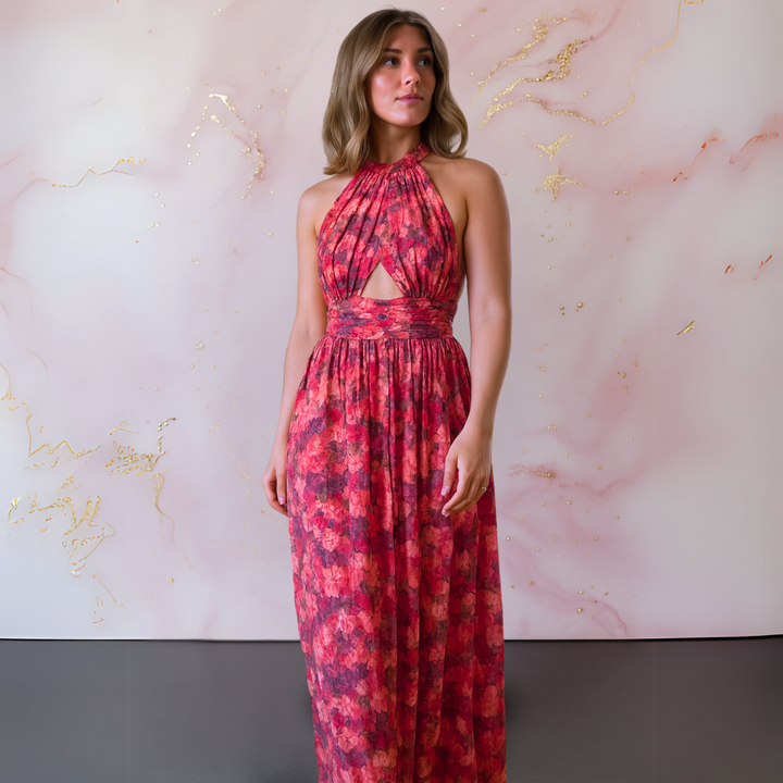 Red halter neck maxi dress for women featuring a stylish front slit, ideal for special occasion wear.