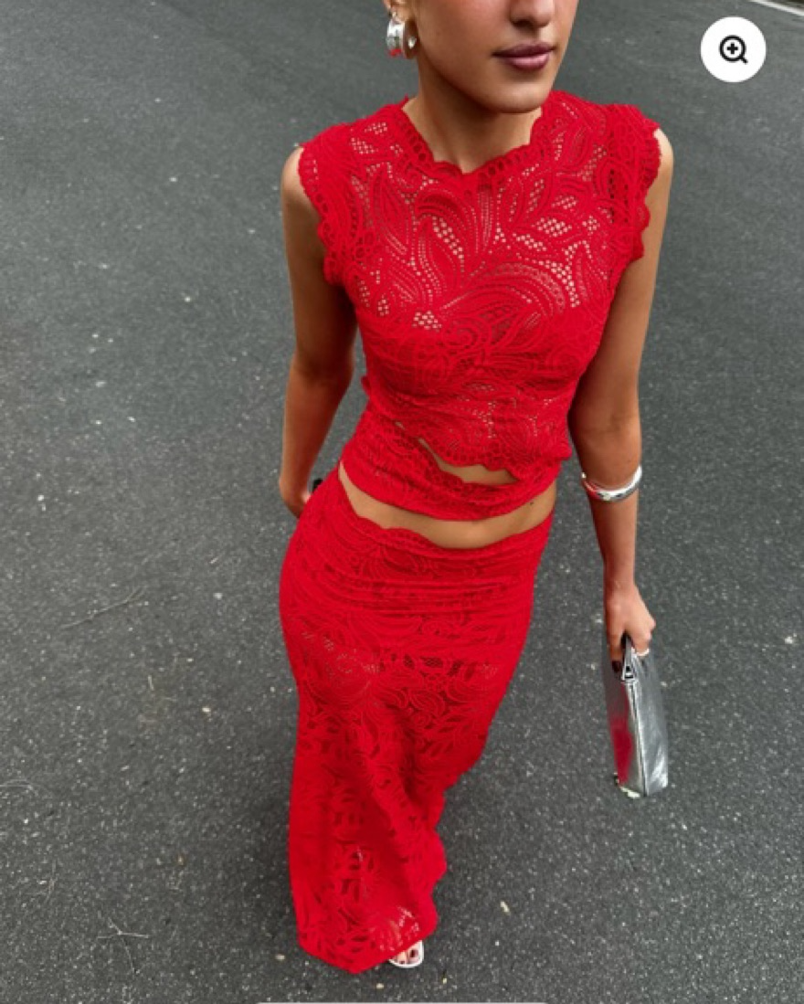 Elegant women's red lace two-piece crop top and high-waisted skirt set, perfect for evening wear.