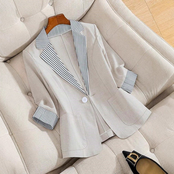 Elegant women's relaxed fit blazer jacket. Sophisticated style for office or smart casual wear.