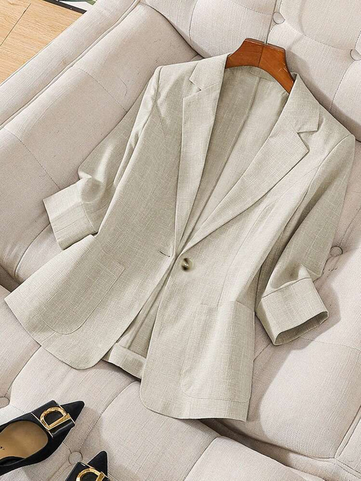 Women's elegant relaxed fit blazer jacket. A versatile lightweight outerwear piece for casual or workwear.