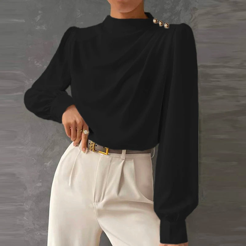 Stylish women's relaxed fit top. Features long sleeves & elegant high neck, ideal for sophisticated fashion.