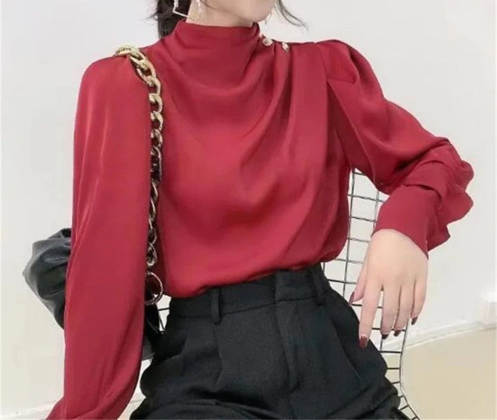 Comfortable women's long sleeve blouse with relaxed fit & high neck. Achieve effortless, stylish sophistication.