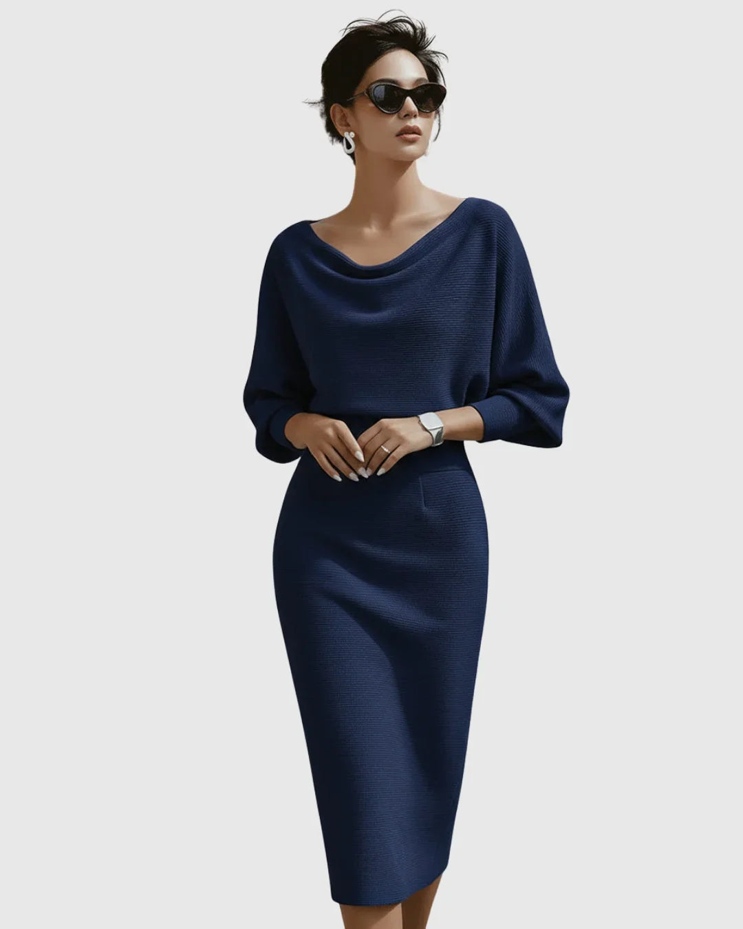 Elegant women's ribbed cowl-neck midi dress with batwing sleeves, a versatile piece for various occasions.
