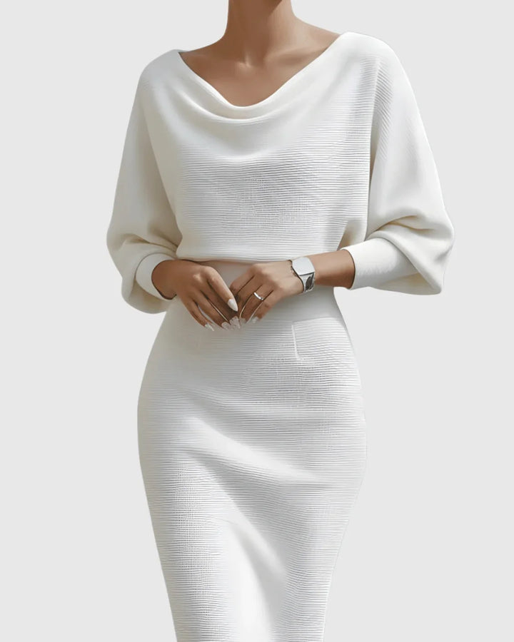Fall/Winter fashion: women's elegant ribbed midi dress, cowl neck, batwing sleeves for a chic, cozy look.