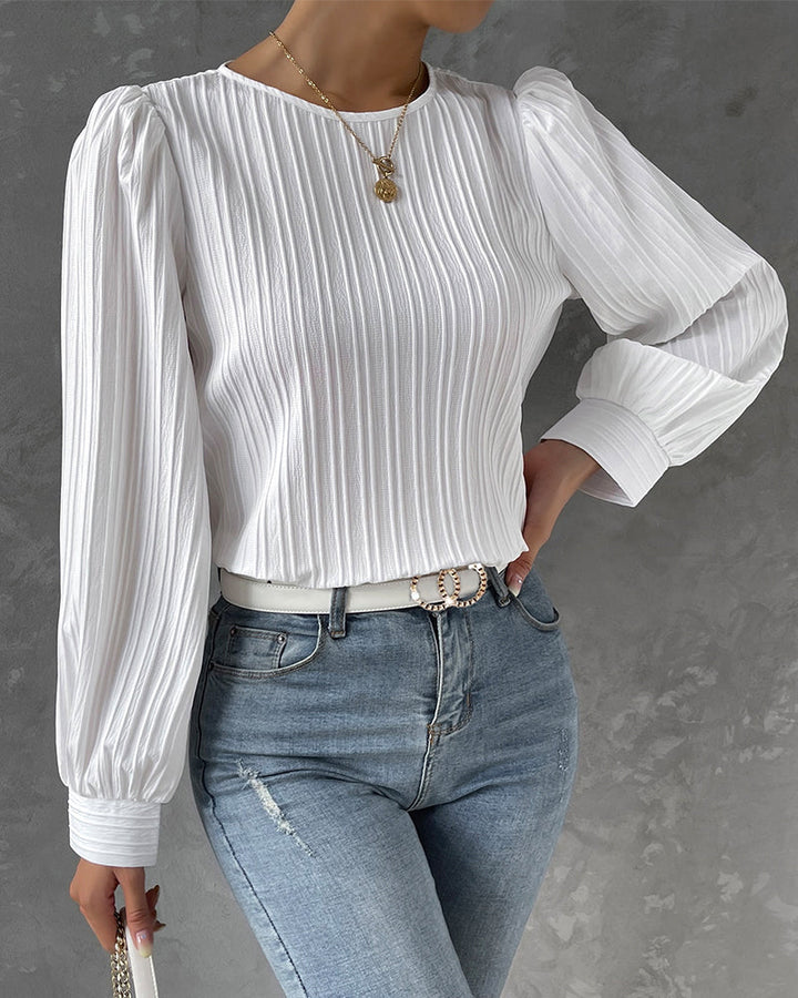 Elegant women's round neck blouse, long sleeve. Perfect for versatile work wear & casual chic style.