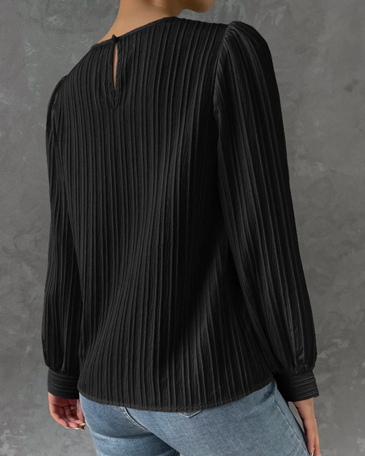 Sophisticated women's round neck long sleeve blouse. Elegant fashion top, perfect for office or casual wear.