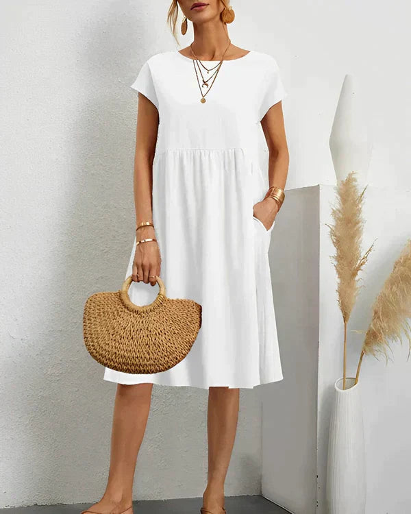 Elegant women's round neck midi dress, perfect for versatile everyday and casual wear.