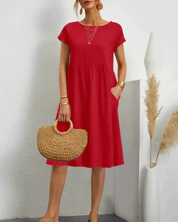 Classic women's elegant midi dress with a comfortable round neck, ideal for versatile everyday wear.