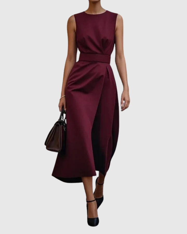 Soft, elegant women's midi dress with a round neck and side slit, offering a comfortable, flattering fit.