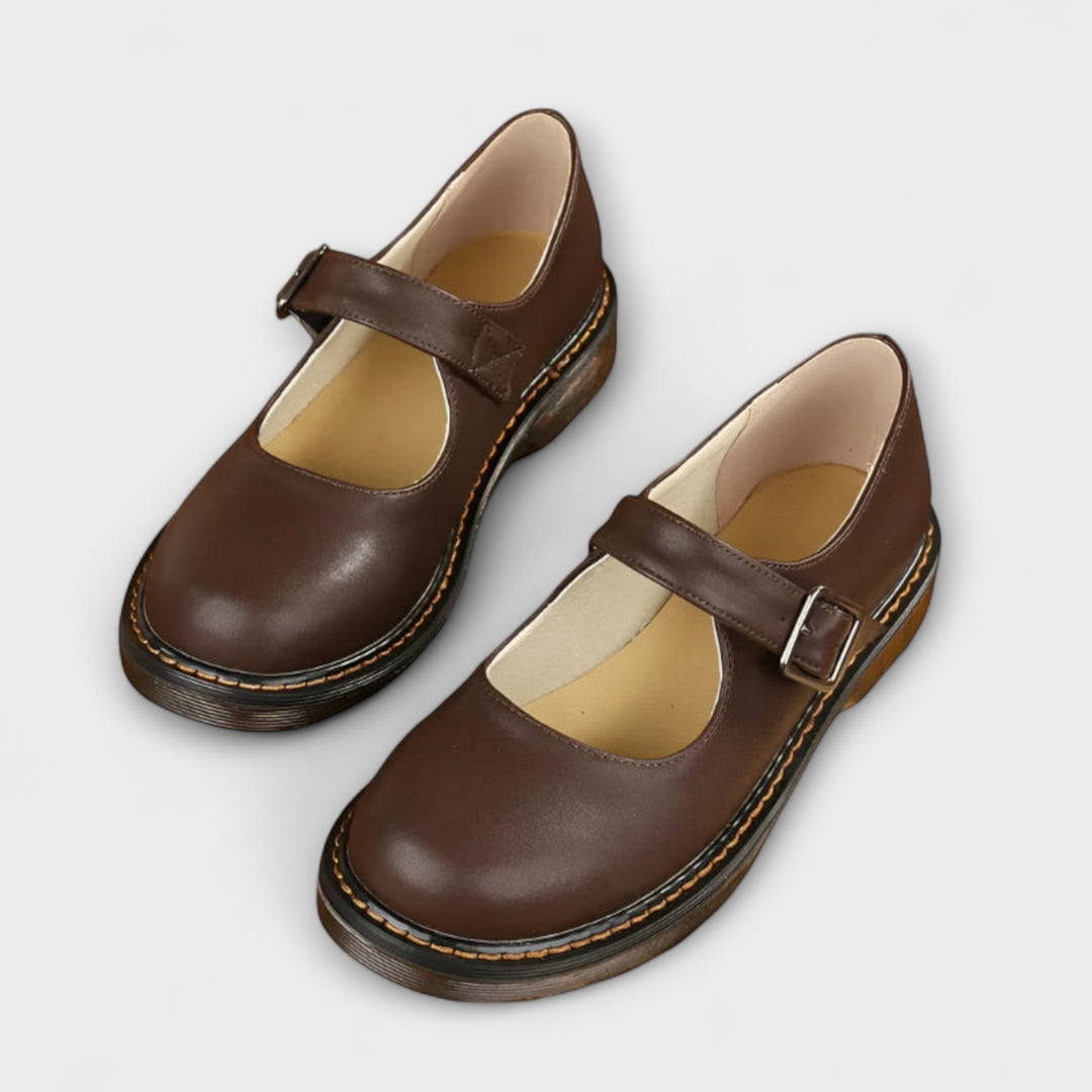 Elegant women's rounded toe low heel shoes with buckled strap, perfect for casual everyday comfort.