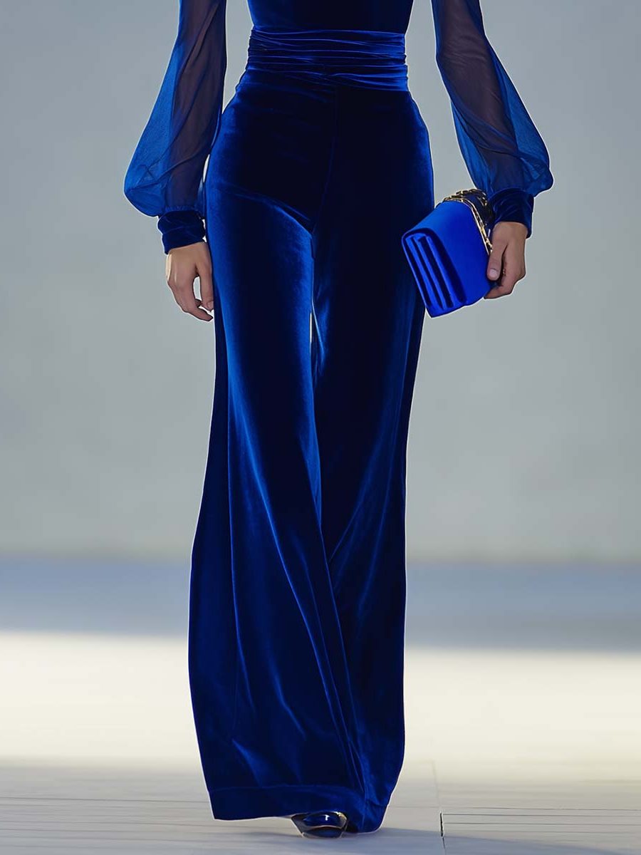 Royal blue elegant women's maxi jumpsuit with a flattering wide-leg silhouette, V-neck, and long sleeves.
