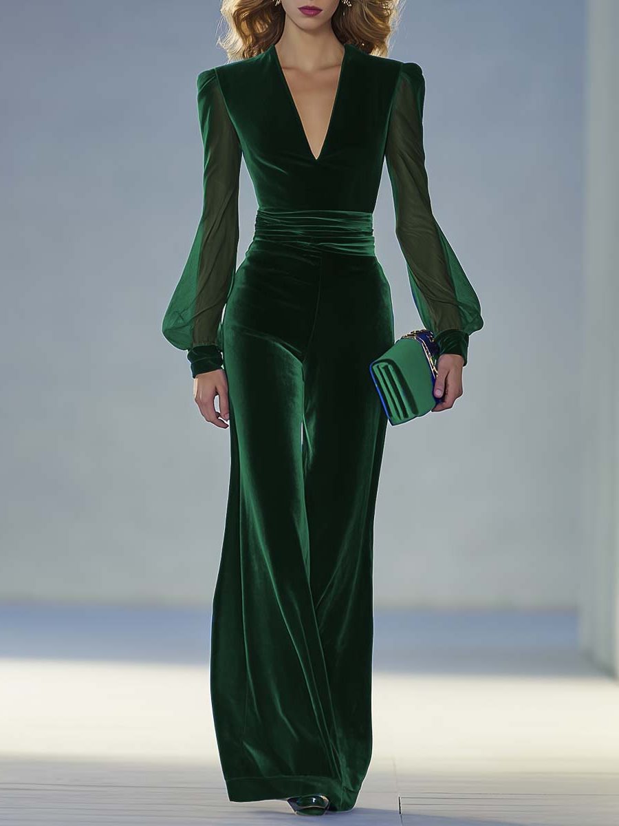 Women's elegant V-neck long-sleeve maxi jumpsuit in royal blue, perfect formal wear or party outfit.
