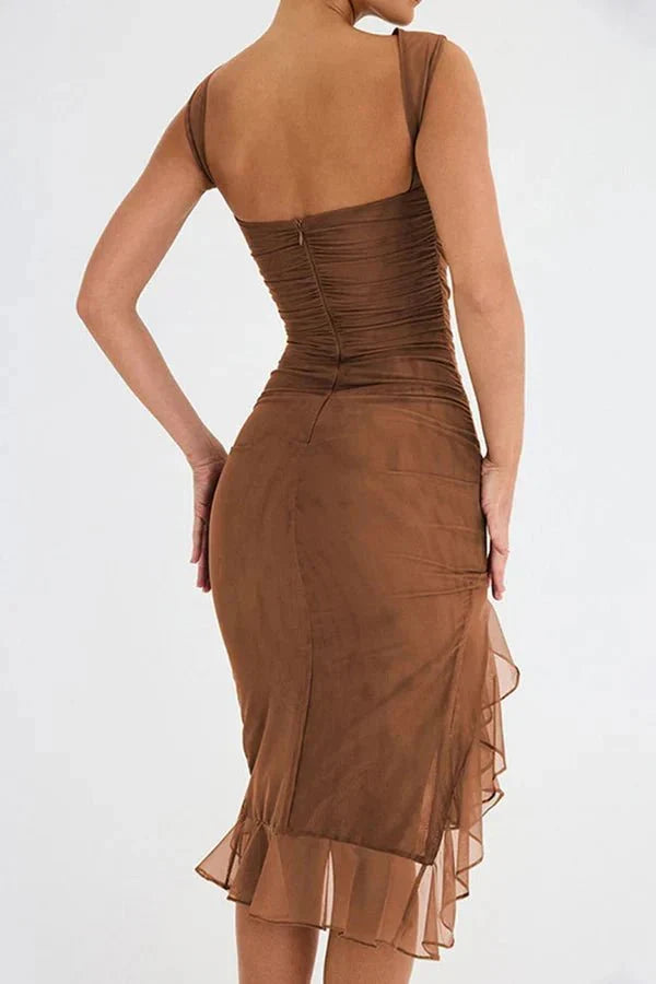 Women's sleeveless ruched midi dress for elegant wedding guest attire & special occasions.